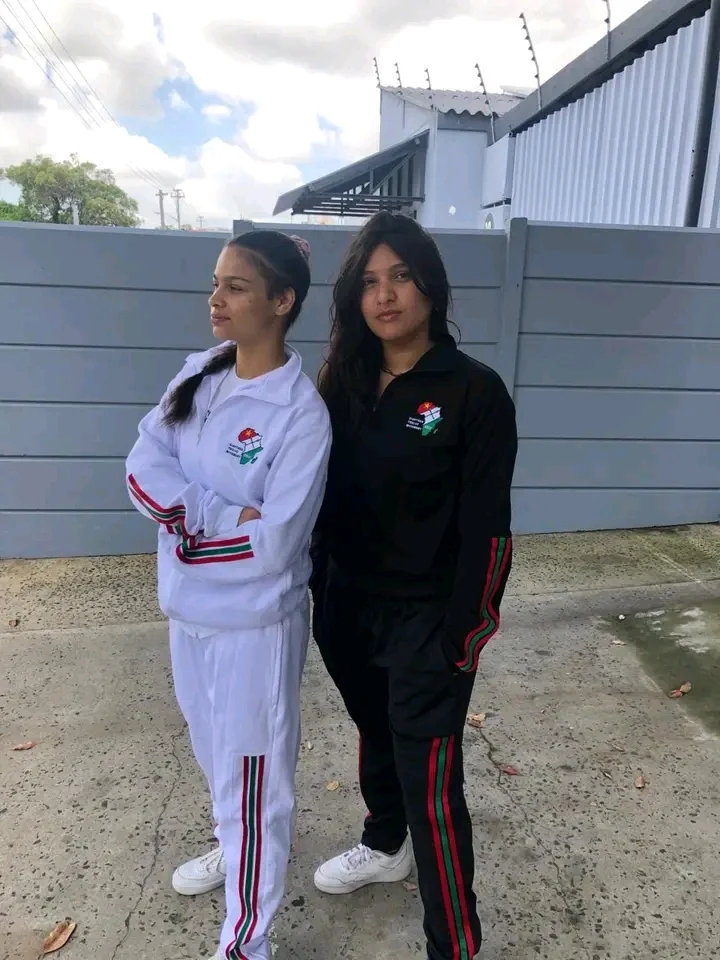 ETM members in branded tracksuits